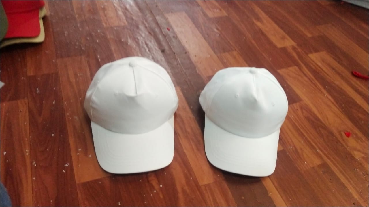 Pair of Two white caps