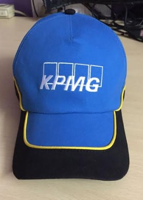 Blue and black cap with yellow lining